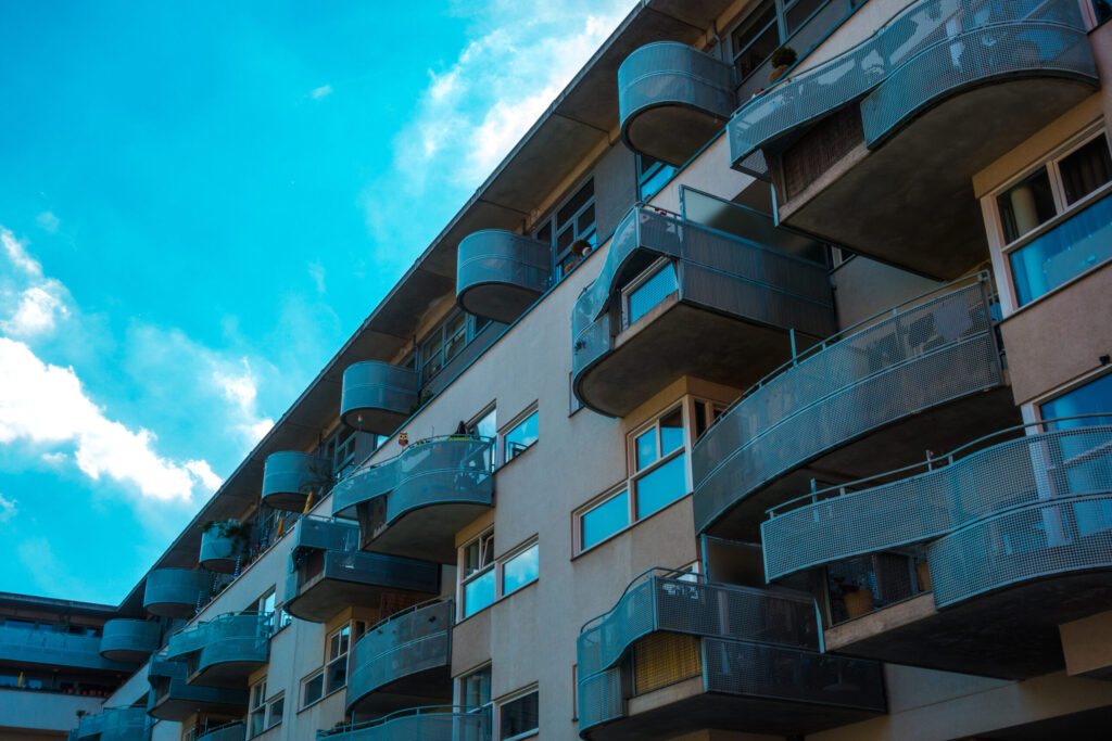 Share Houses for International Students in Japan: How They Work and How to Find One apartment building with balconies against blue sky 2026 03 25 22 53 45 utc