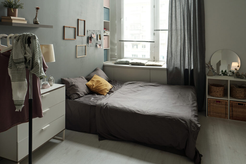Share Houses for International Students in Japan: How They Work and How to Find One interior of bedroom with bed, furniture, rack for clothes and other stuff