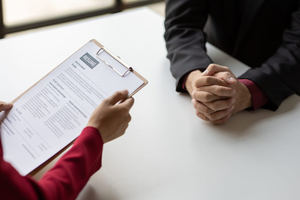 Japanese Job Interviews: What to expect as a Foreign Candidate business meeting discussing a resume on a table 2026 01 09 13 10 32 utc