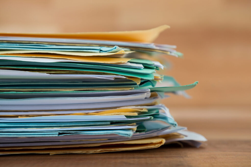 Visa Renewal in Japan: Timing, Documents, and Common Reasons for Delays close up of stacked files on table 2026 01 11 10 31 22 utc