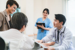 doctor checking consultation with patient for checkup. work on healthcare paperwork