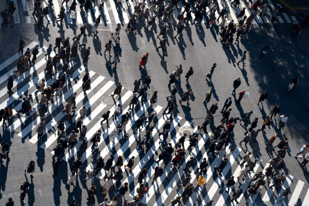 How Japan's National Health Insurance Works for Foreign Residents pedestrians crossing a crosswalk in shibuya japan 2026 03 25 06 41 35 utc