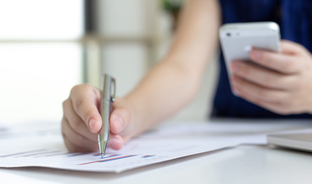 Understanding Mobile Contract Cancellation Fees in Japan professional analyzing charts while using mobile p 2026 01 08 06 54 51 utc
