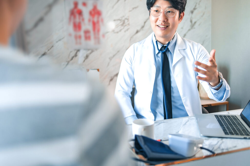 medicine and health care concept. asian doctor is taking care