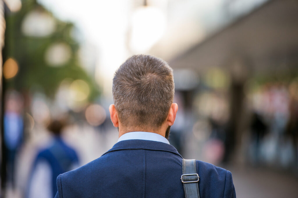 Share Houses for International Students in Japan: How They Work and How to Find One unrecognizable manager walking in the street, rear view