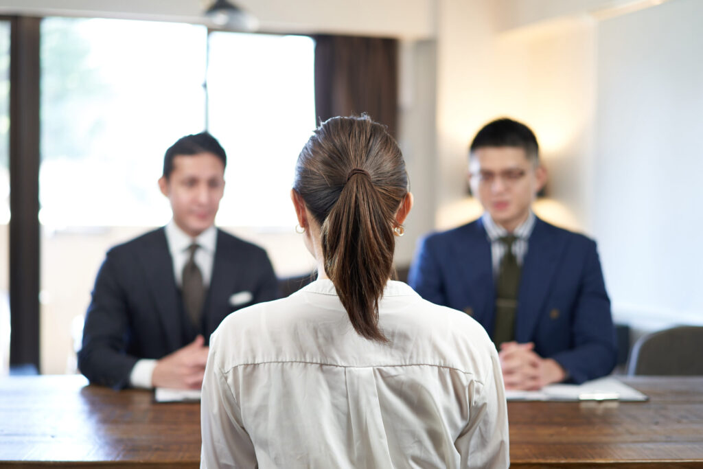asian female business woman interviewed in business casual