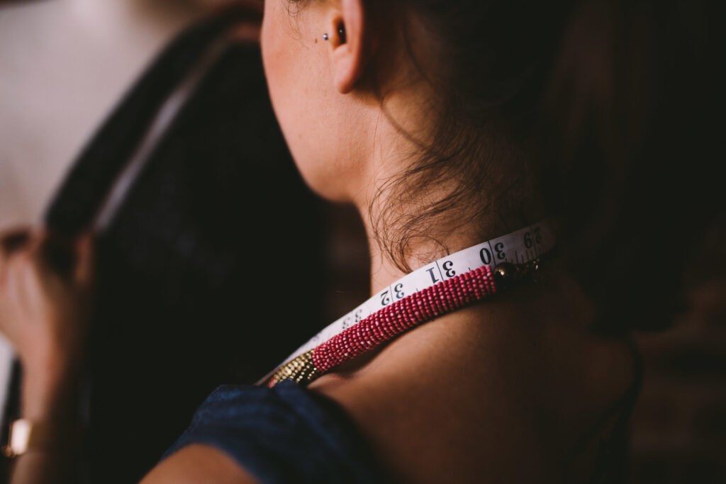 What to Do If You Have a Problem With Your Landlord in Japan woman with measuring tape around neck in studio 2026 03 10 00 04 15 utc