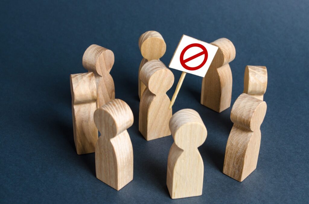 What to Do If Your Rental Application Is Rejected in Japan wooden figures demonstrate opposition with red cir 2026 03 24 02 23 24 utc