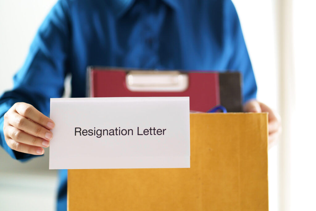 How to Resign From a Job in Japan: Notice Periods and Etiquette quit job business man sending resignation letter and packing stu