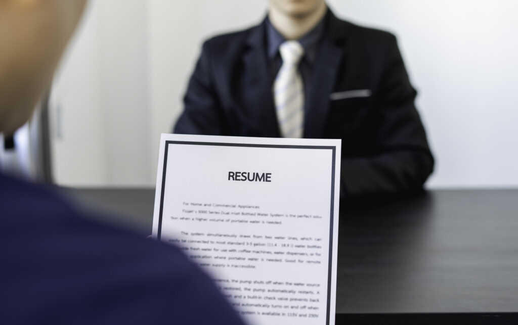 Is Job Hopping Frowned Upon in Japan? A Guide for Career Changers reviewing resume during a professional job intervi 2026 09 21 18 30 48 utc